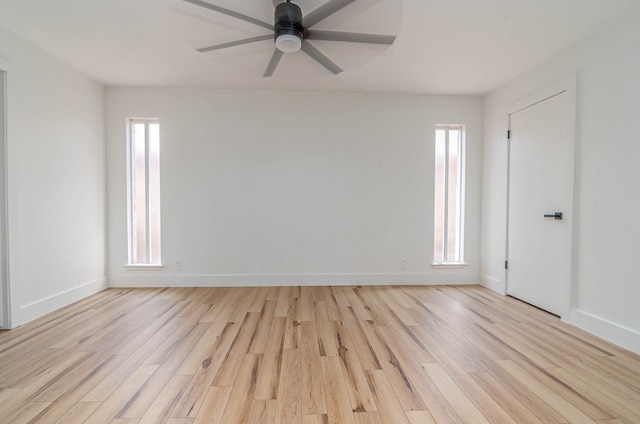1017 Ward St, Midland, TX 79701 - unfurnished room with a ceiling fan, light wood-style floors, and baseboards