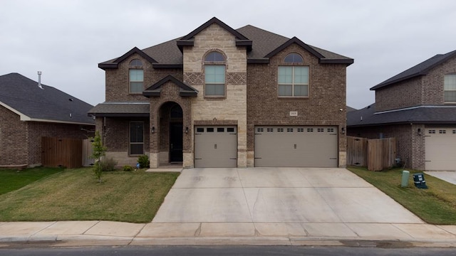 view of front of house featuring concrete driveway, brick siding, fence, and a garage