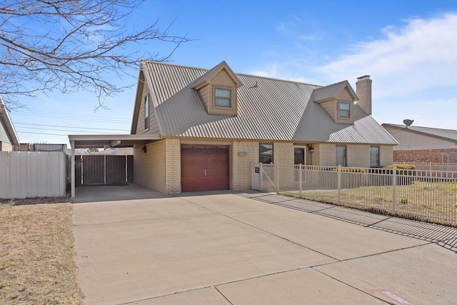 view of front of property featuring a carport and a garage