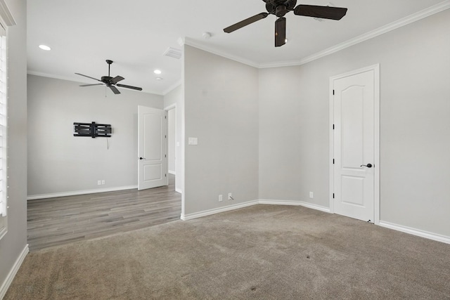 unfurnished room featuring ceiling fan, recessed lighting, crown molding, baseboards, and carpet flooring