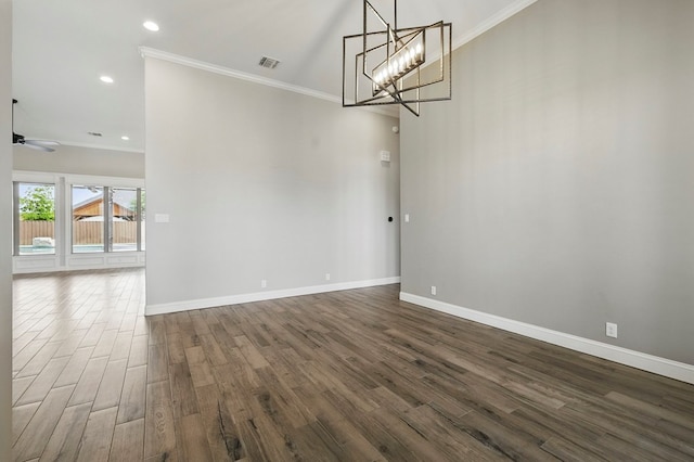 unfurnished dining area with ornamental molding, dark wood-type flooring, baseboards, ceiling fan, and recessed lighting