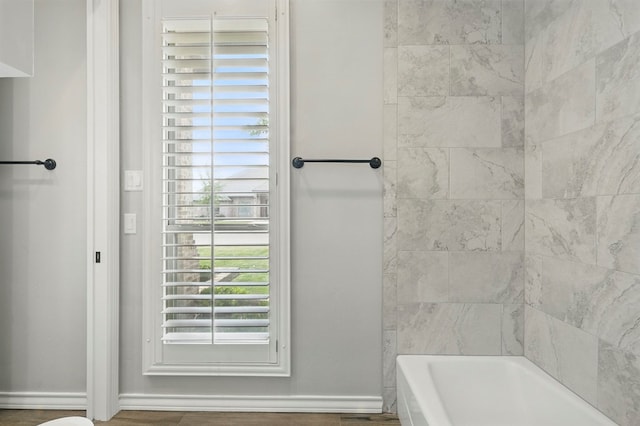 full bath featuring tub / shower combination