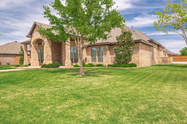 view of front of home with brick siding