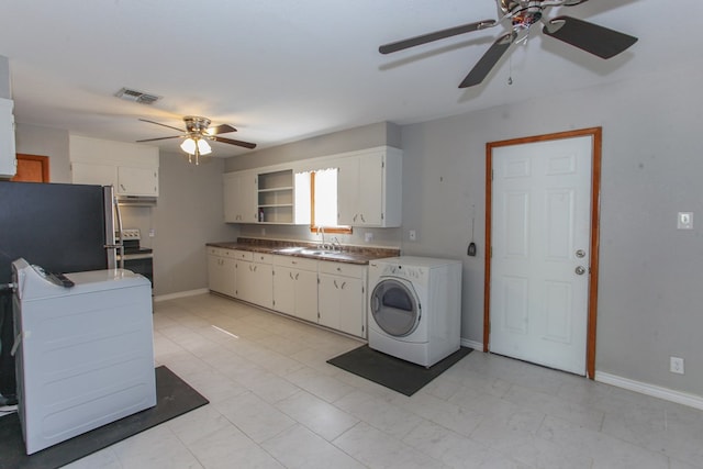 2004 State St, Big Spring, TX 79720 - laundry room featuring washer / clothes dryer and ceiling fan