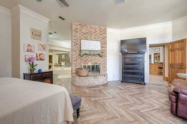bedroom with a fireplace, ornamental molding, visible vents, and connected bathroom