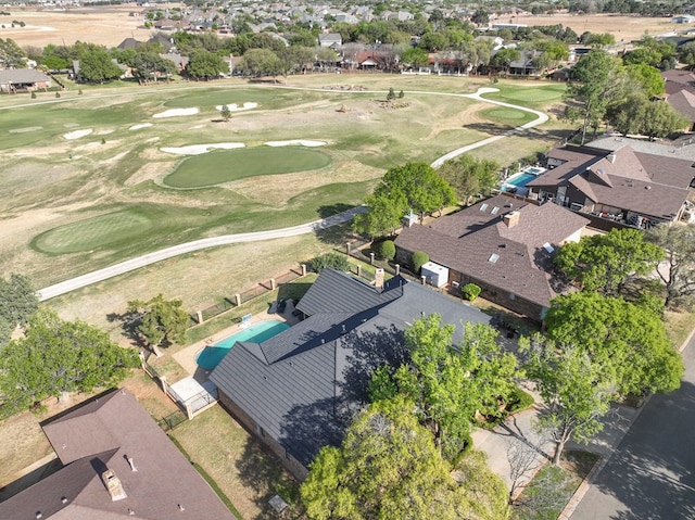 drone / aerial view with a residential view and view of golf course