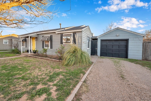 611 Storey Ave, Midland, TX 79703 - ranch-style home featuring driveway, a garage, and an outdoor structure