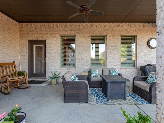 view of patio with ceiling fan and outdoor lounge area