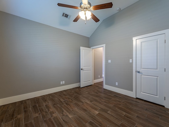 unfurnished bedroom with high vaulted ceiling, ceiling fan, visible vents, baseboards, and dark wood finished floors