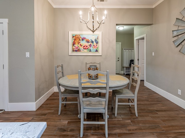 dining area with an inviting chandelier, dark wood-style flooring, and crown molding