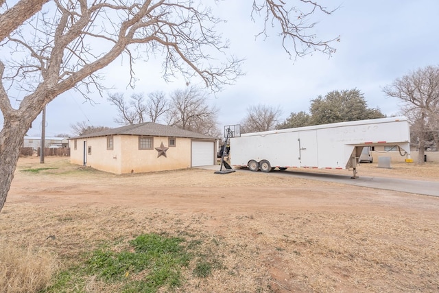 exterior space featuring a garage