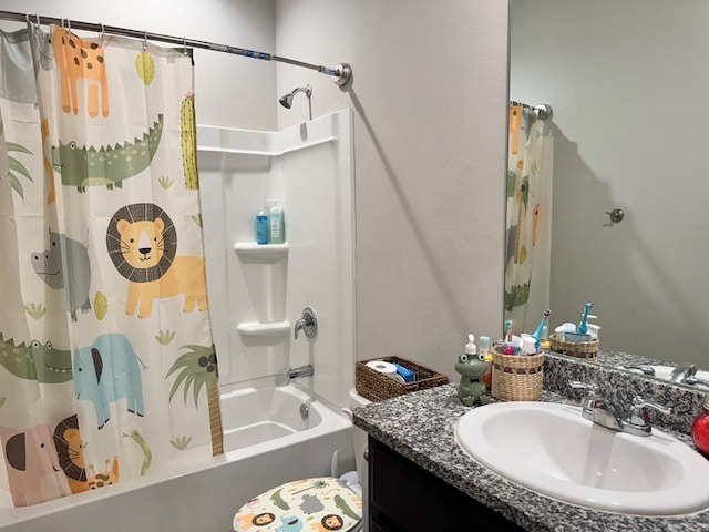 full bathroom featuring vanity and shower / bathtub combination with curtain