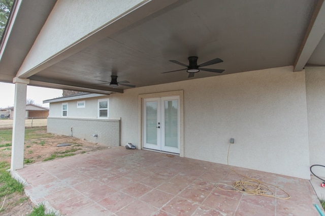 view of patio featuring french doors and ceiling fan