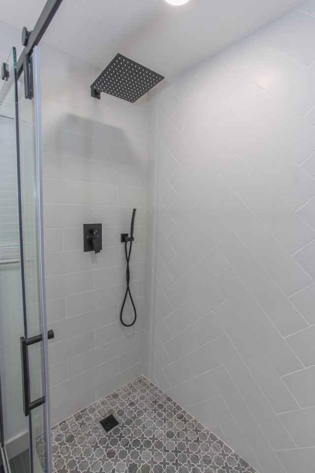 bathroom featuring an enclosed shower