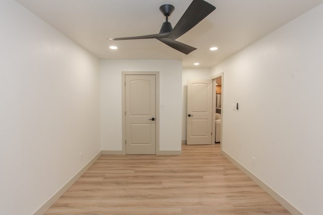 hall with light wood-type flooring