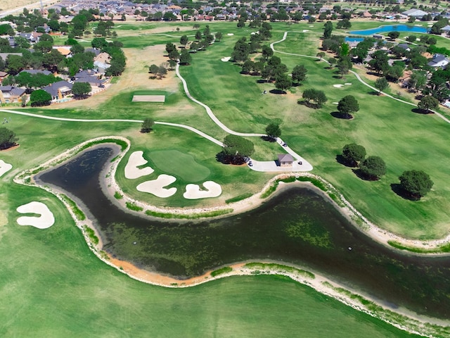 bird's eye view with a water view, golf course view, and a residential view