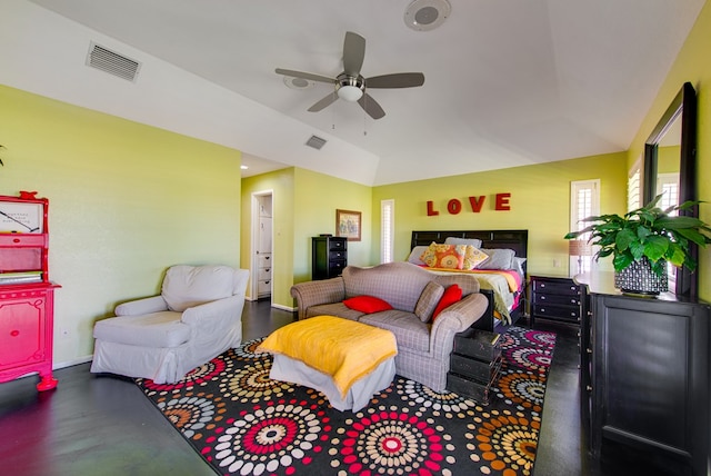 bedroom with ceiling fan, visible vents, and vaulted ceiling