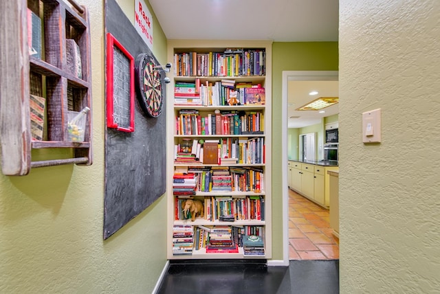 interior space with a textured wall