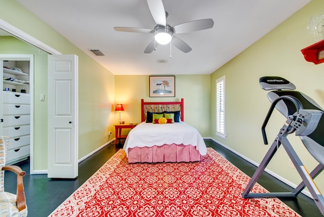 bedroom with baseboards, ceiling fan, and visible vents