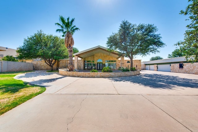 single story home with a garage