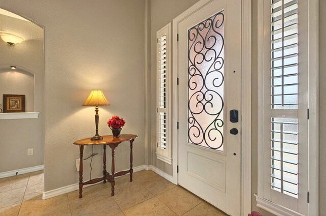 1302 Telluride Dr, Midland, TX 79705 - entrance foyer with baseboards and light tile patterned flooring