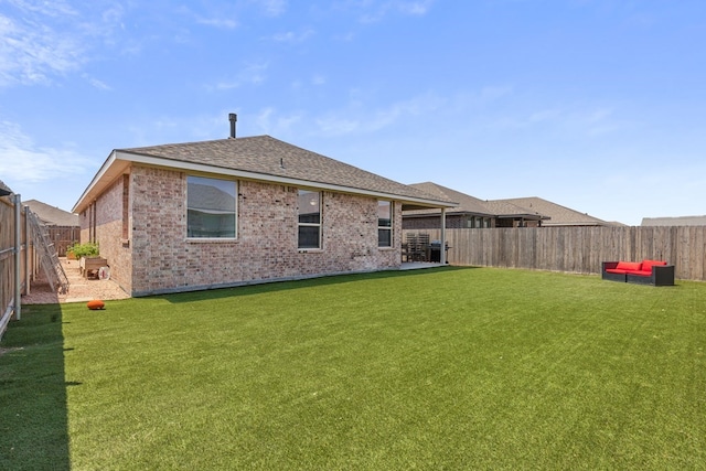7104 Mcpherson Ln, Midland, TX 79706 - rear view of property with brick siding, roof with shingles, and a patio area