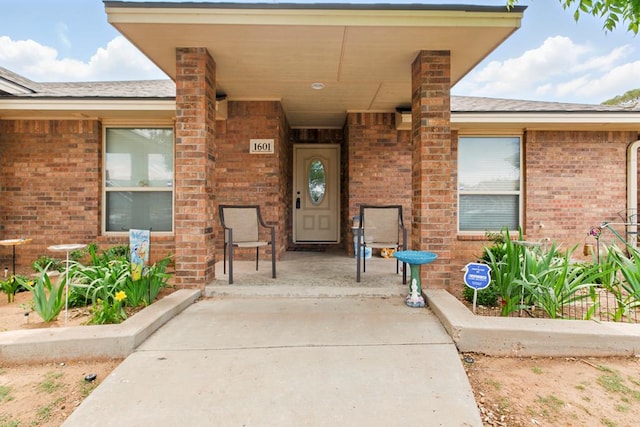 1601 Monterrey Dr, Midland, TX 79703 - property entrance with brick siding and covered porch