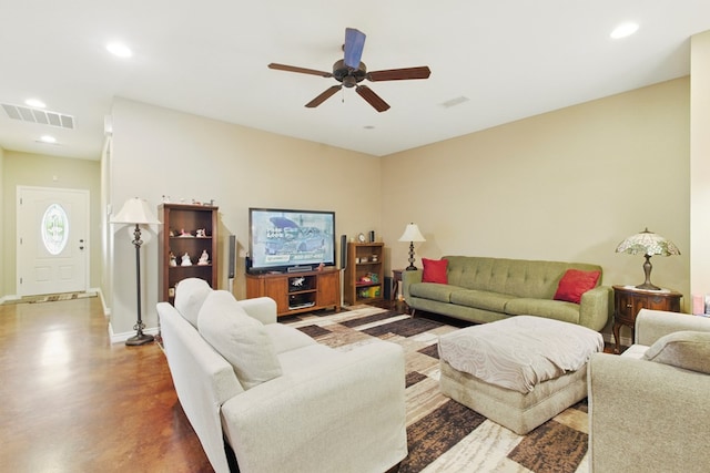 1601 Monterrey Dr, Midland, TX 79703 - living area with ceiling fan, recessed lighting, finished concrete floors, and baseboards