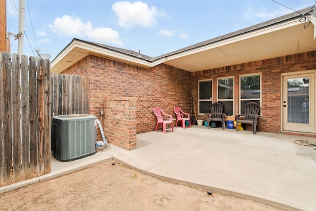 1601 Monterrey Dr, Midland, TX 79703 - view of patio / terrace featuring central AC and fence