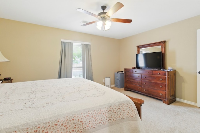 1601 Monterrey Dr, Midland, TX 79703 - bedroom featuring light colored carpet, baseboards, and a ceiling fan