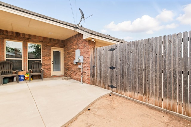 1601 Monterrey Dr, Midland, TX 79703 - view of patio with fence and a gate