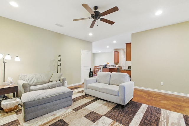 1601 Monterrey Dr, Midland, TX 79703 - living area with recessed lighting, ceiling fan, baseboards, and concrete flooring