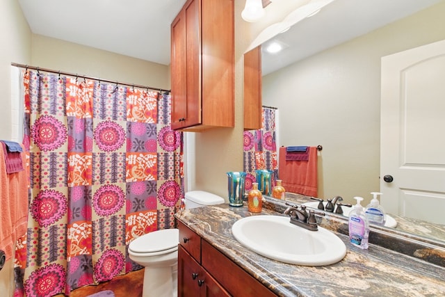 1601 Monterrey Dr, Midland, TX 79703 - full bath with toilet, vanity, and a shower with curtain