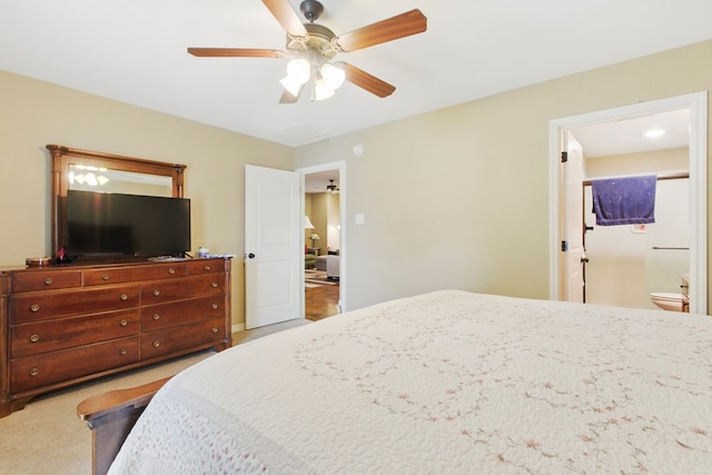 1601 Monterrey Dr, Midland, TX 79703 - carpeted bedroom featuring a ceiling fan and ensuite bathroom