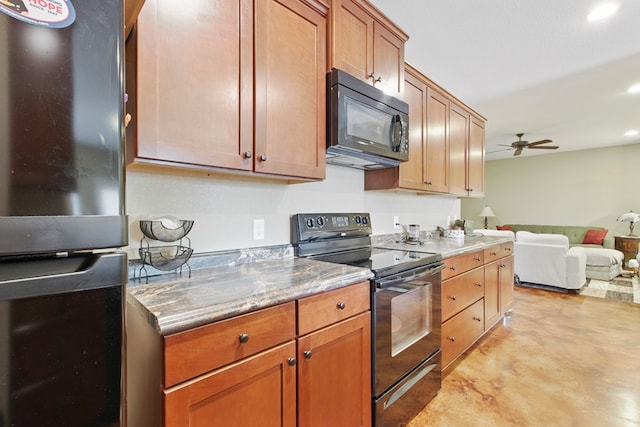 1601 Monterrey Dr, Midland, TX 79703 - kitchen featuring black appliances, concrete floors, ceiling fan, open floor plan, and recessed lighting