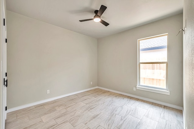 spare room featuring ceiling fan