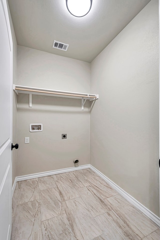 clothes washing area with hookup for a washing machine and electric dryer hookup