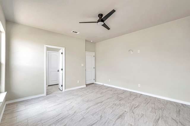 unfurnished bedroom featuring ceiling fan