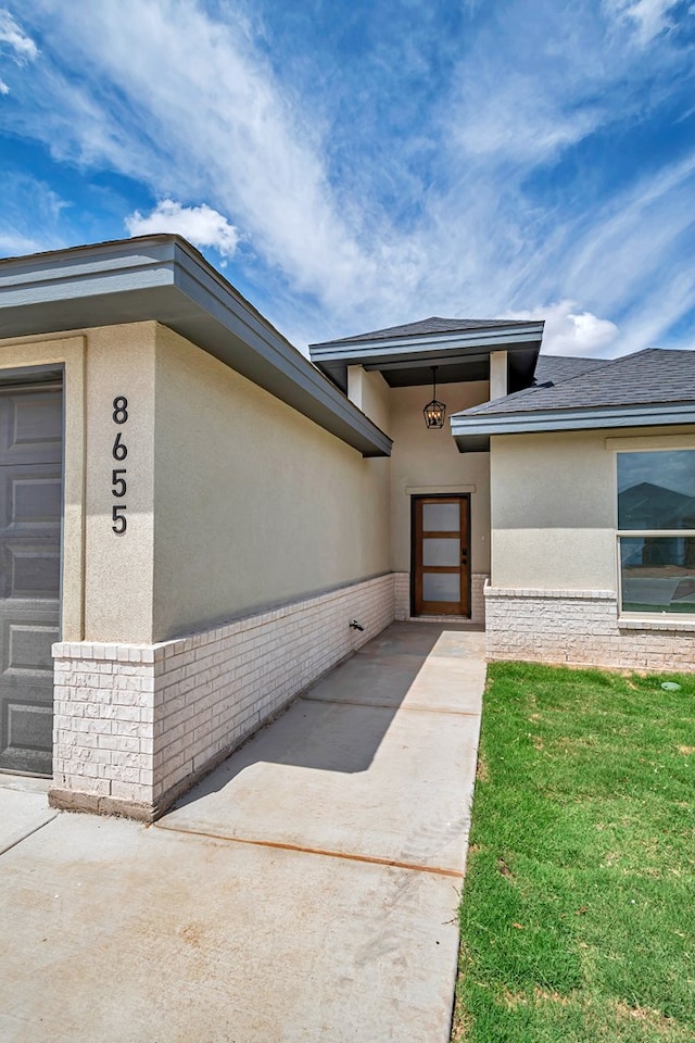 property entrance featuring a garage