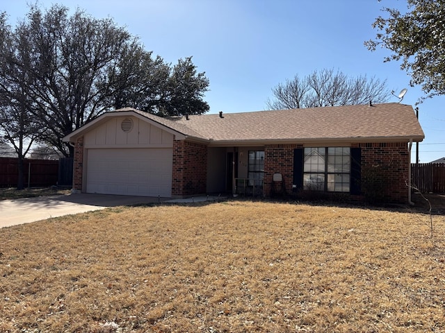 single story home with brick siding, board and batten siding, an attached garage, and fence