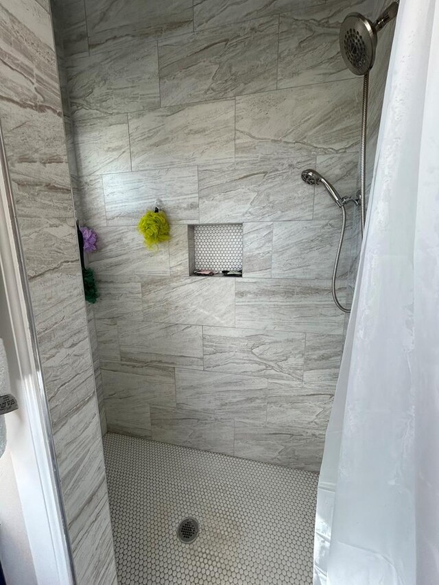 bathroom with walk in shower