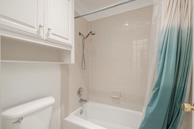 full bathroom with shower / bath combo and toilet