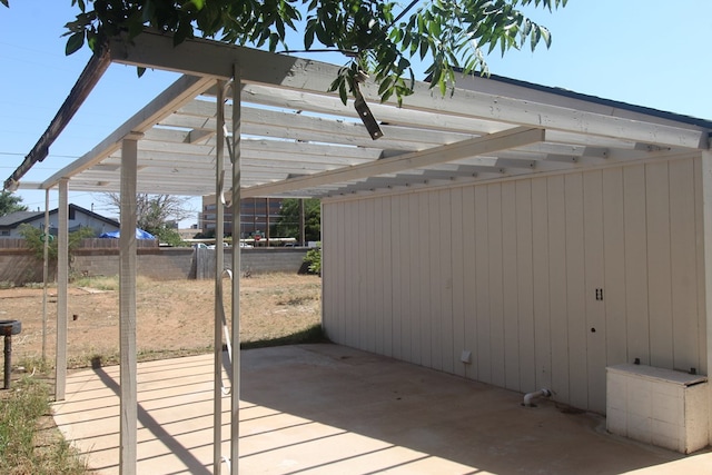 309 W Estes Ave, Midland, TX 79701 - wooden terrace featuring a patio