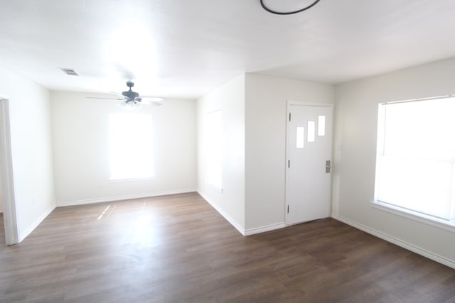 309 W Estes Ave, Midland, TX 79701 - entrance foyer featuring healthy amount of natural light, wood finished floors, and ceiling fan