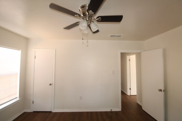 309 W Estes Ave, Midland, TX 79701 - spare room with dark wood-type flooring and ceiling fan
