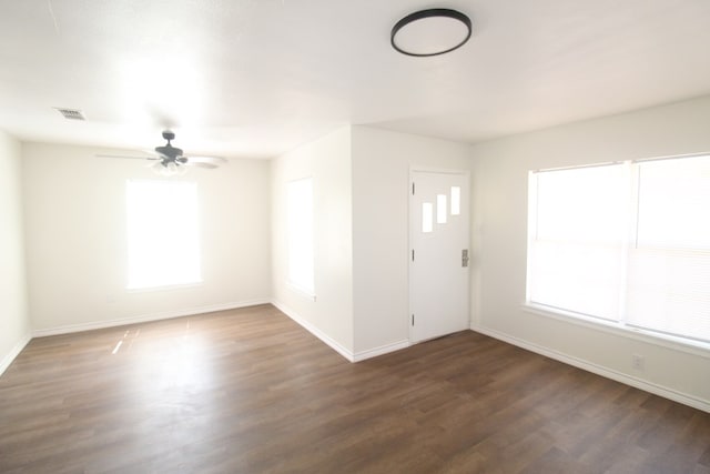 309 W Estes Ave, Midland, TX 79701 - foyer featuring dark wood-type flooring, plenty of natural light, and ceiling fan