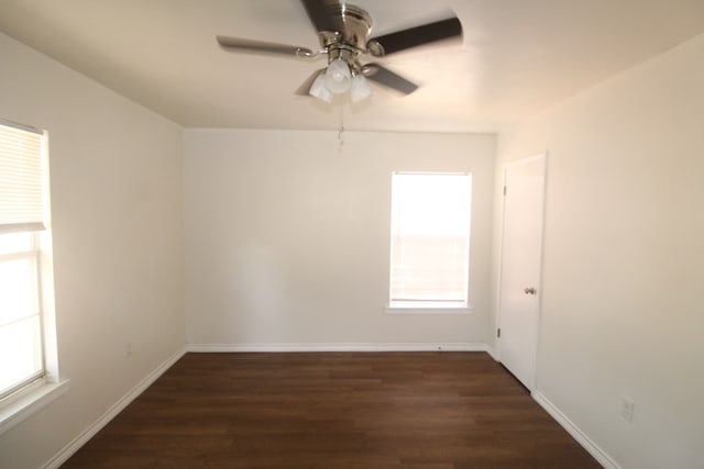 309 W Estes Ave, Midland, TX 79701 - spare room with healthy amount of natural light, a ceiling fan, and wood finished floors