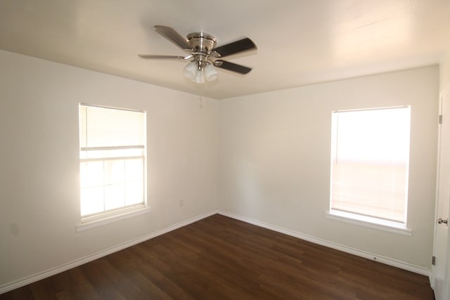 309 W Estes Ave, Midland, TX 79701 - empty room featuring dark wood-style flooring and ceiling fan