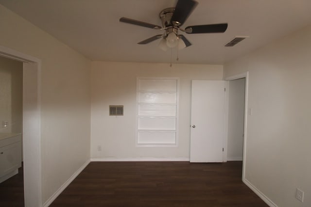 309 W Estes Ave, Midland, TX 79701 - unfurnished room featuring dark wood-type flooring and a ceiling fan