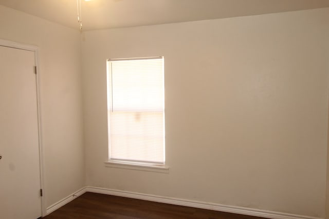 309 W Estes Ave, Midland, TX 79701 - empty room with dark wood-type flooring and baseboards